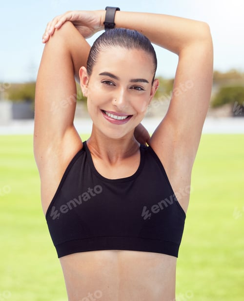 Preview: Happy, training and fitness by woman stretching with smile for exercise stadium or wellness health
