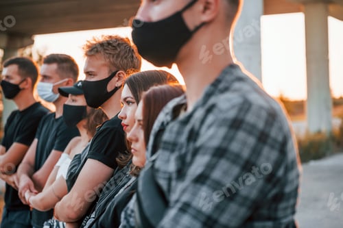 Preview: Group of protesting young people that standing together