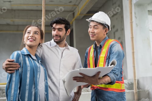 Preview: Asian couple checks the work of a contractor building a house for them