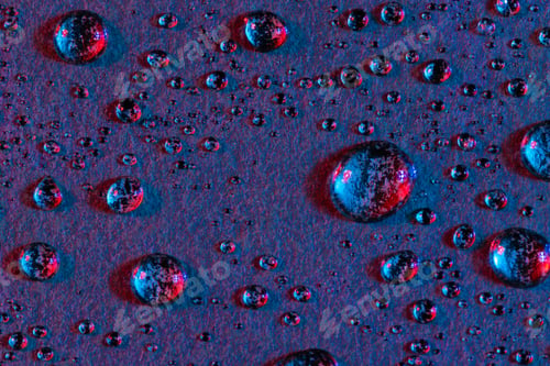 Preview: Micro close up of water drops with copy space on purple background