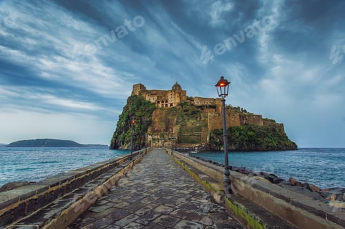 Preview: Ischia, Italy with Aragonese Castle in the Mediterranean at dusk