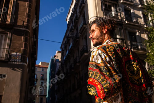 Preview: Stylish man walking on street