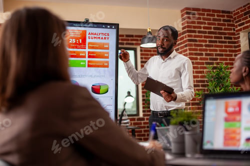 Preview: Businessman doing project presentation