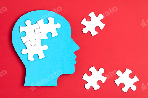 Preview: Papercut head with jigsaw puzzle pieces inside. Mental health problems, psychology, memory, logic