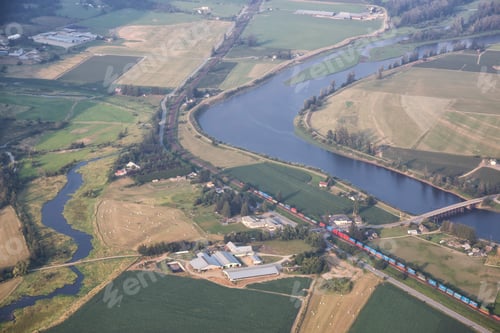 Preview: Aerial view of homes and farm fields in Fraser Valley