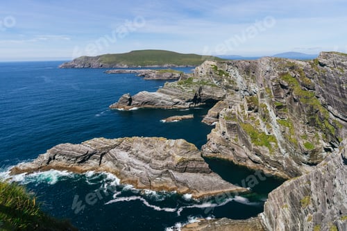 Preview: Majestic Irish Cliffs: Illuminated Beauty of Azure Sky, Pristine Ocean