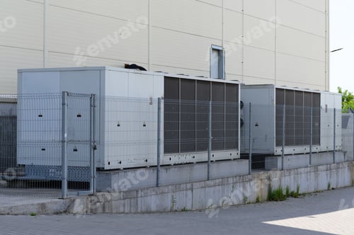 Preview: Large industrial air conditioner on the side of the mall.