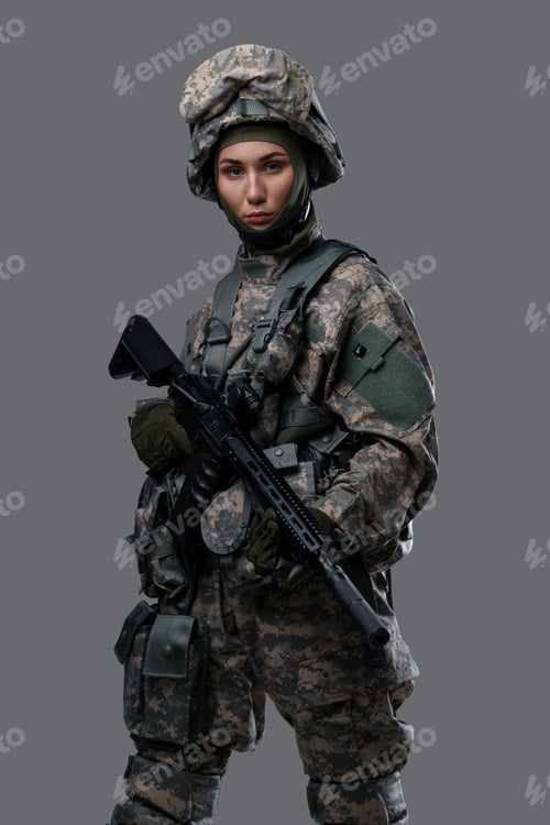 Preview: Military woman with rifle dressed in camouflage suit