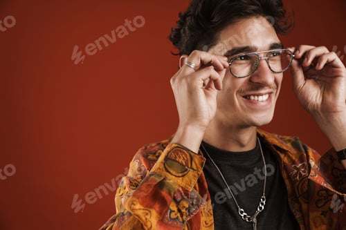 Preview: Portrait of a smiling casual hipster man standing