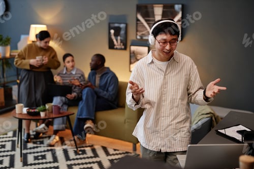 Preview: Asian man talking in online meeting