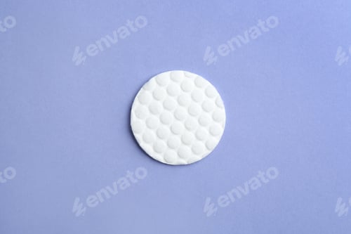 Preview: Cotton pad on color background, top view