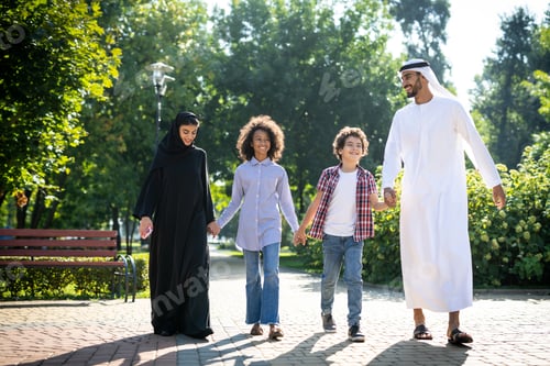 Preview: Cinematic image of a family from the emirates spending time at the park