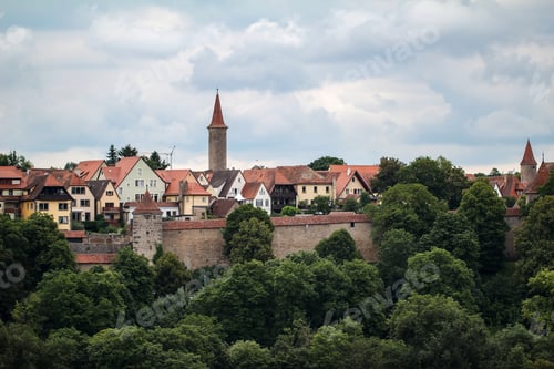 Preview: Fascinating shot of the town of Rothenburg ob der Tauber, Germany under the clear cloudy sky