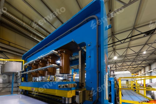 Preview: Photo of steel roofing forming machine. Industrial machine for metal sheet roof coils cut. Process