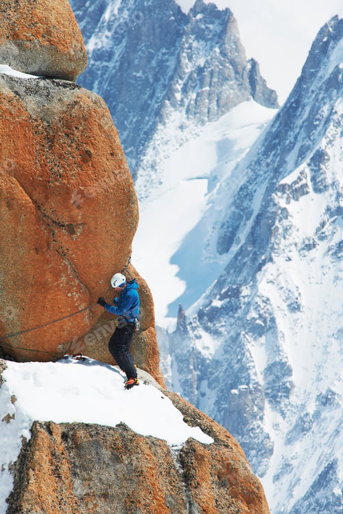 Preview: Mature man mountain climbing, Chamonix, France