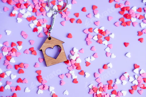 Preview: Valentine's day concept many small hearts and keychain on purple background