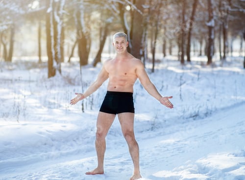 Preview: Full length portrait of senior man exposing himself to cold weather, standing in underwear at frosty