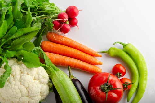 Preview: Isolated group of winter season vegetables over white flat lay view. Includes copy space.