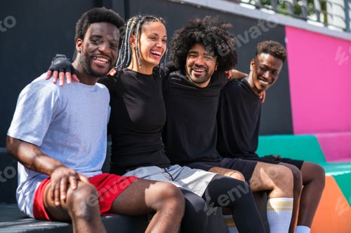 Preview: Group of young friends enjoying free time in the park