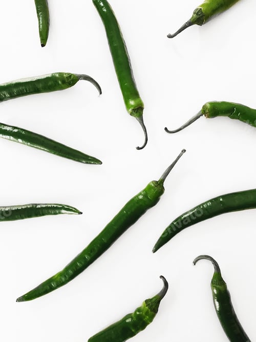 Preview: Food Pattern from Many Green Spicy Peppers on Light Background