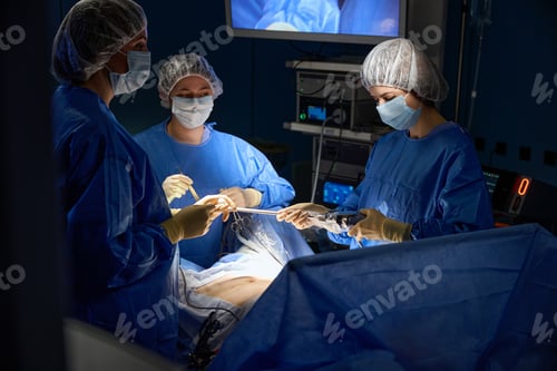 Preview: Surgeons Performing Operation in Hospital Operating Room