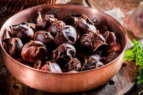 Preview: Homemade chestnuts with parsley on old wooden table