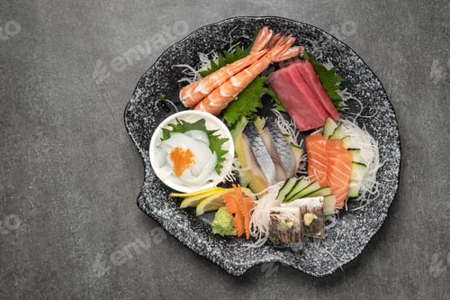 Preview: mixed sashimi plate in japanese restaurant on grey background