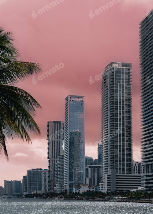 Preview: Stunning image of a city skyline featuring modern skyscrapers against a dramatic sky on a cloudy day