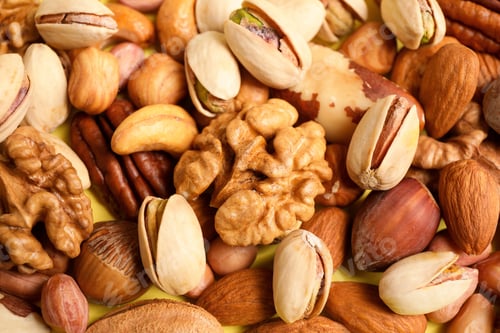 Preview: Different delicious nuts as background, closeup view