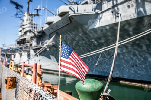 Preview: Selective focus shot of an American flag waving in the wind