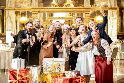 Preview: Well-dressed people celebrating New Year indoors