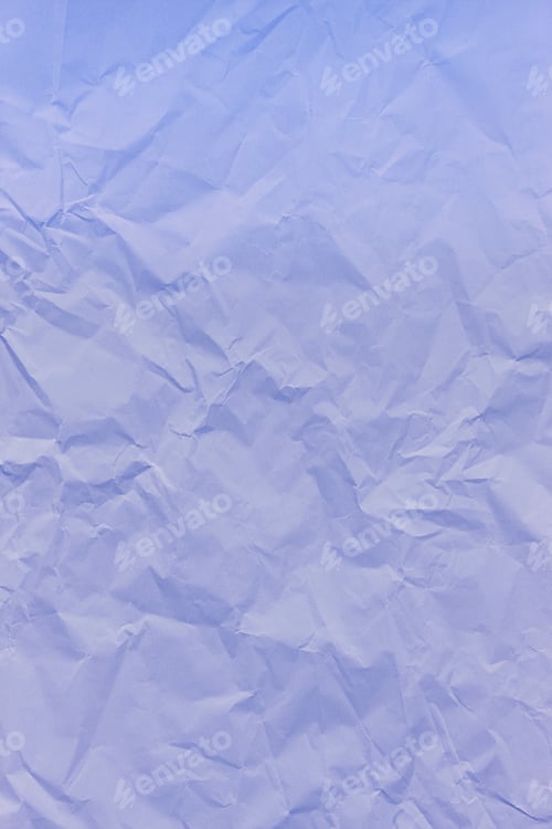 Preview: Purple crumpled wrinkled textured paper background.