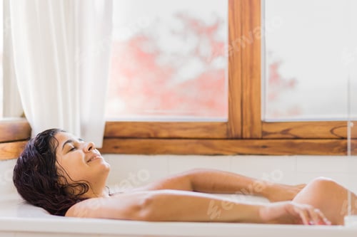 Preview: Relaxing Woman Lying Back in a Bathtub