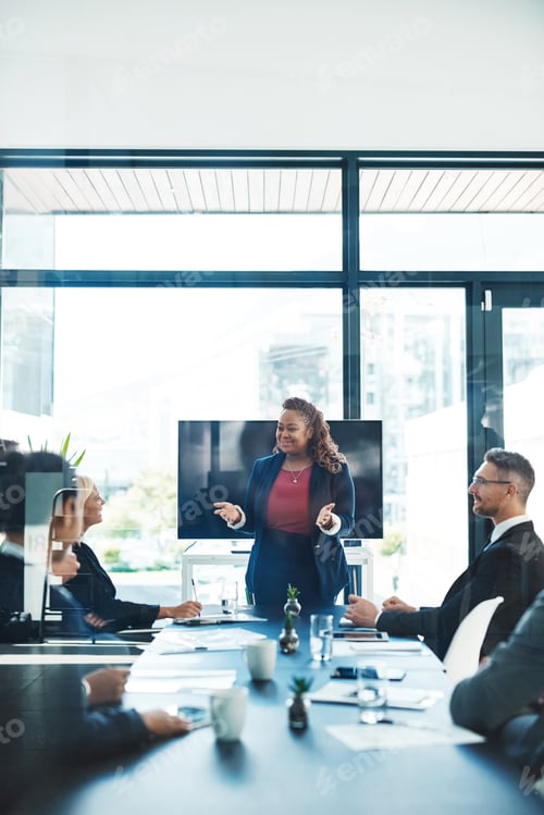 Preview: Cropped shot of an attractive young businesswoman giving a presentation in the boardroom