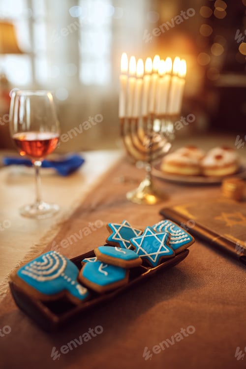 Preview: Cookies on dining table during Jewish festival of lights, Hanukkah.