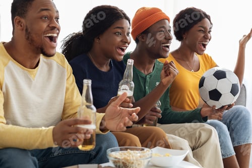 Preview: Emotional african american friends watching football game on TV, closeup