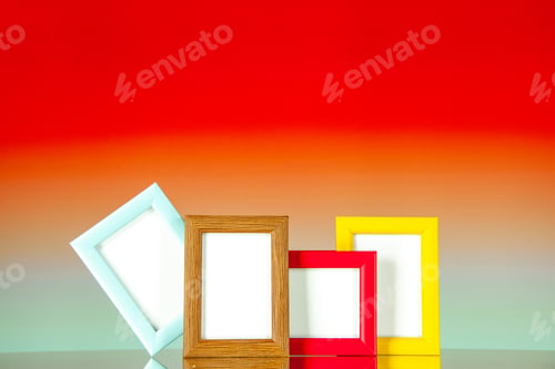 Preview: front view different picture frames with colored corners on light red background picture family
