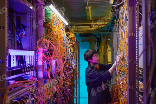 Preview: Technician Inspecting Server Hub