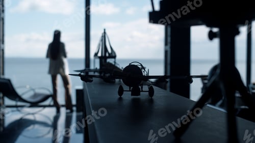 Preview: Millennial director consider solution at office window. Decision making concept