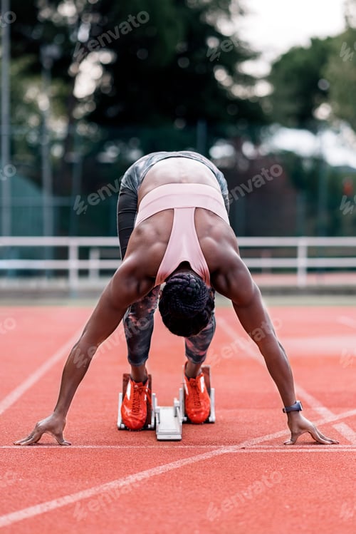 Preview: Athlete sprinter in starting position