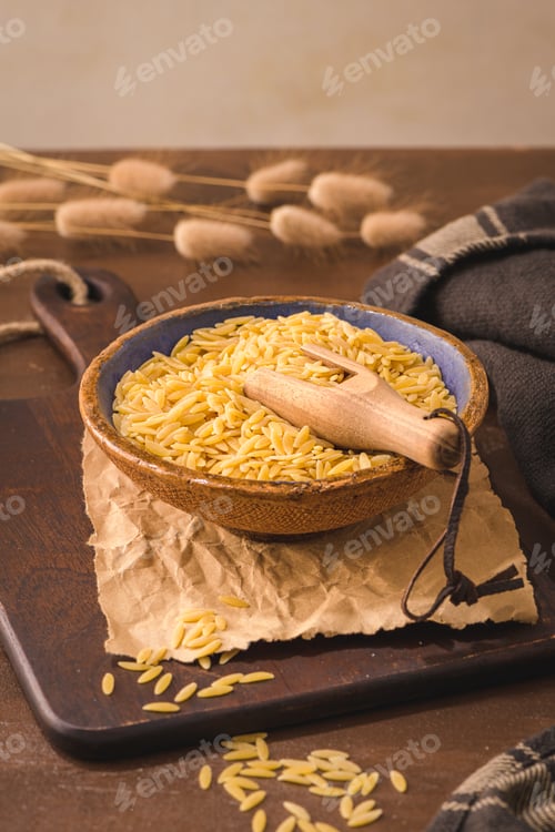 Preview: Dry risoni pasta in a ceramic bowl