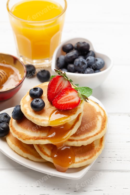 Preview: Healthy breakfast with pancakes and orange juice