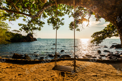 Preview: Swing on a beautiful beach at sunset. Koh Chang. Thailand