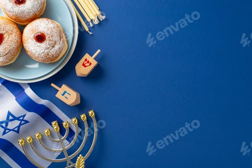 Preview: Honor the Hanukkah season with a top-view photo featuring sufganiyot, Israeli flag, candles