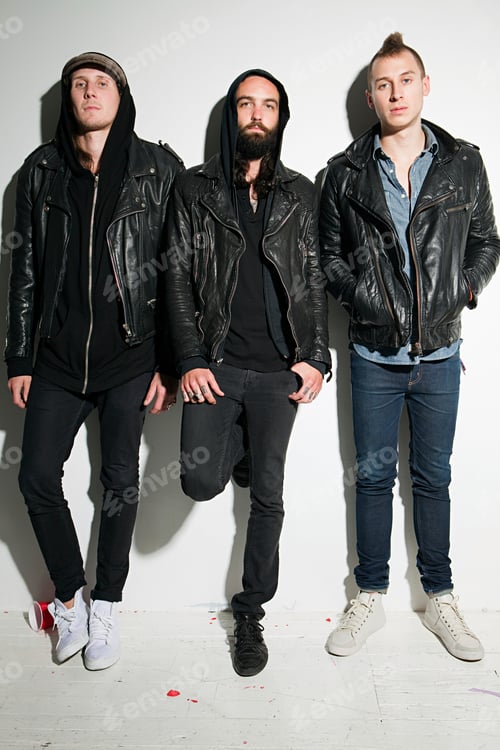 Preview: Three men wearing leather jackets at party