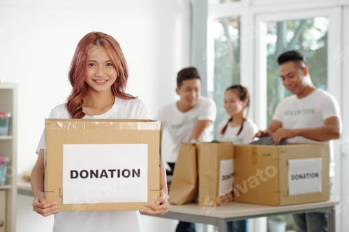 Preview: Happy Young Female Volunteer