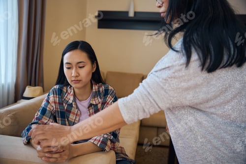Preview: Mother snatching mobile phone out of her adult offspring hands
