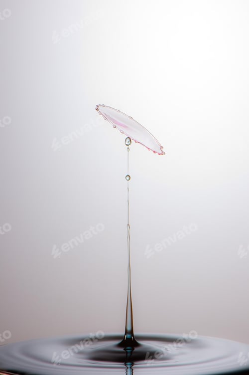Preview: Splash of colorful liquid with high speed flash