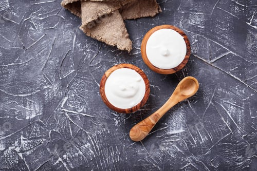 Preview: White Greek yogurt in wooden bowl