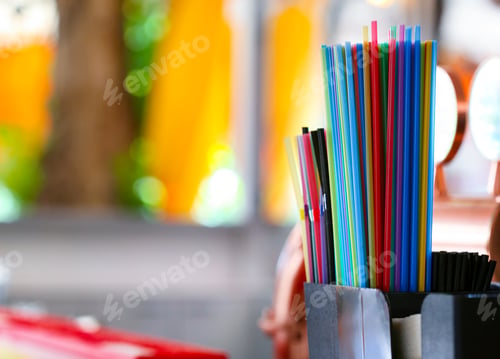 Preview: Tubes of different colors on the table in the bar